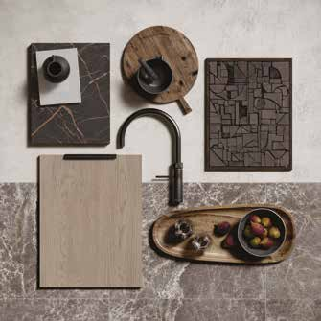 Warm wood, dramatic stone, and bold detailing deliver a refined yet inviting aesthetic.